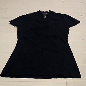 Size medium, V neck, shirt sleeve, INC sweater.